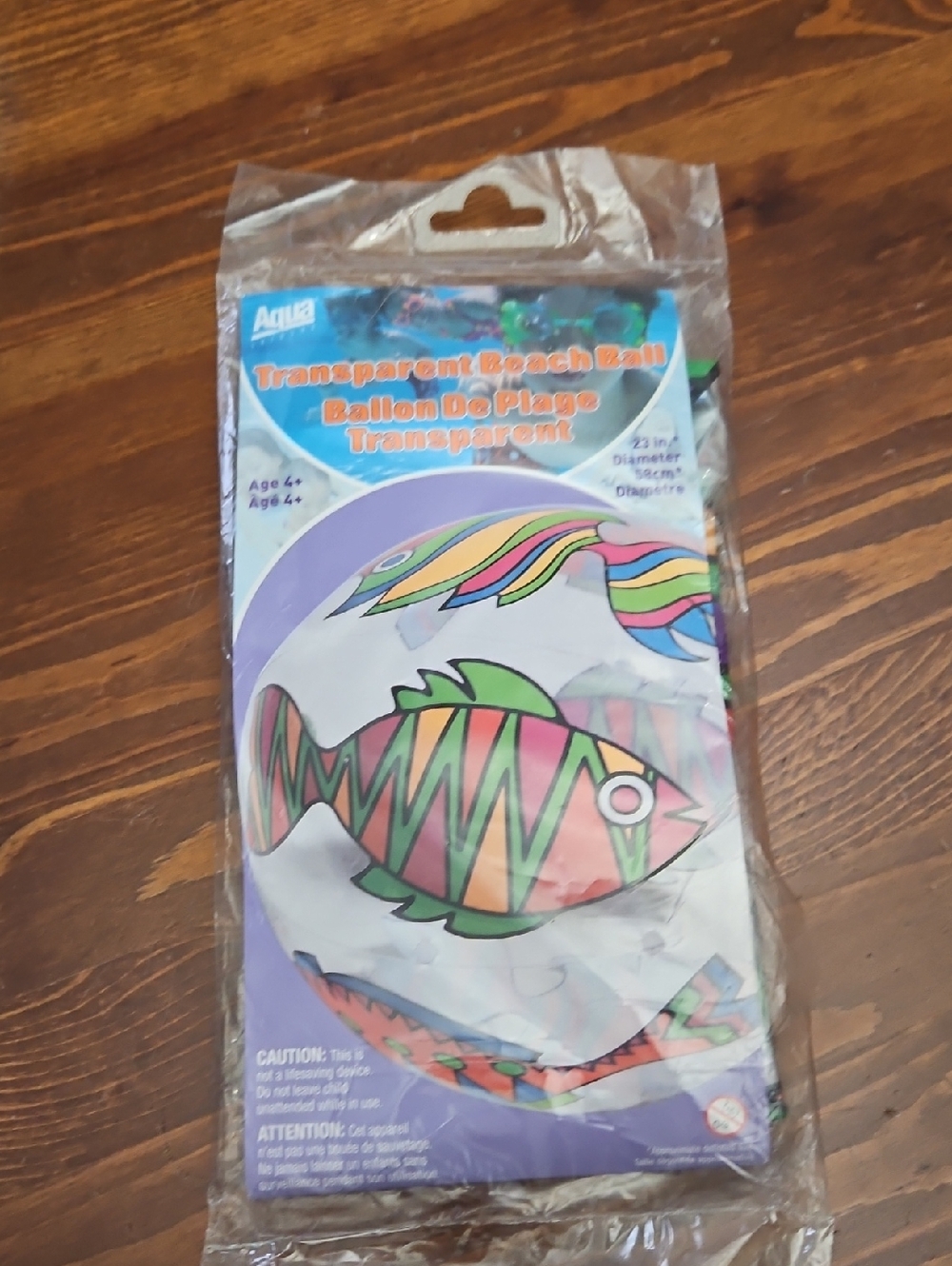 Aqua Transparent Beach Ball with Multicolor Fish and Rainbow Waves